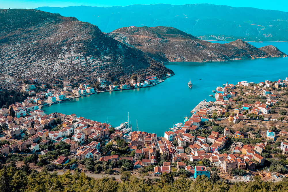 Aerial view of a sailing yacht in a turquoise bay on the Turkish Lycian coast