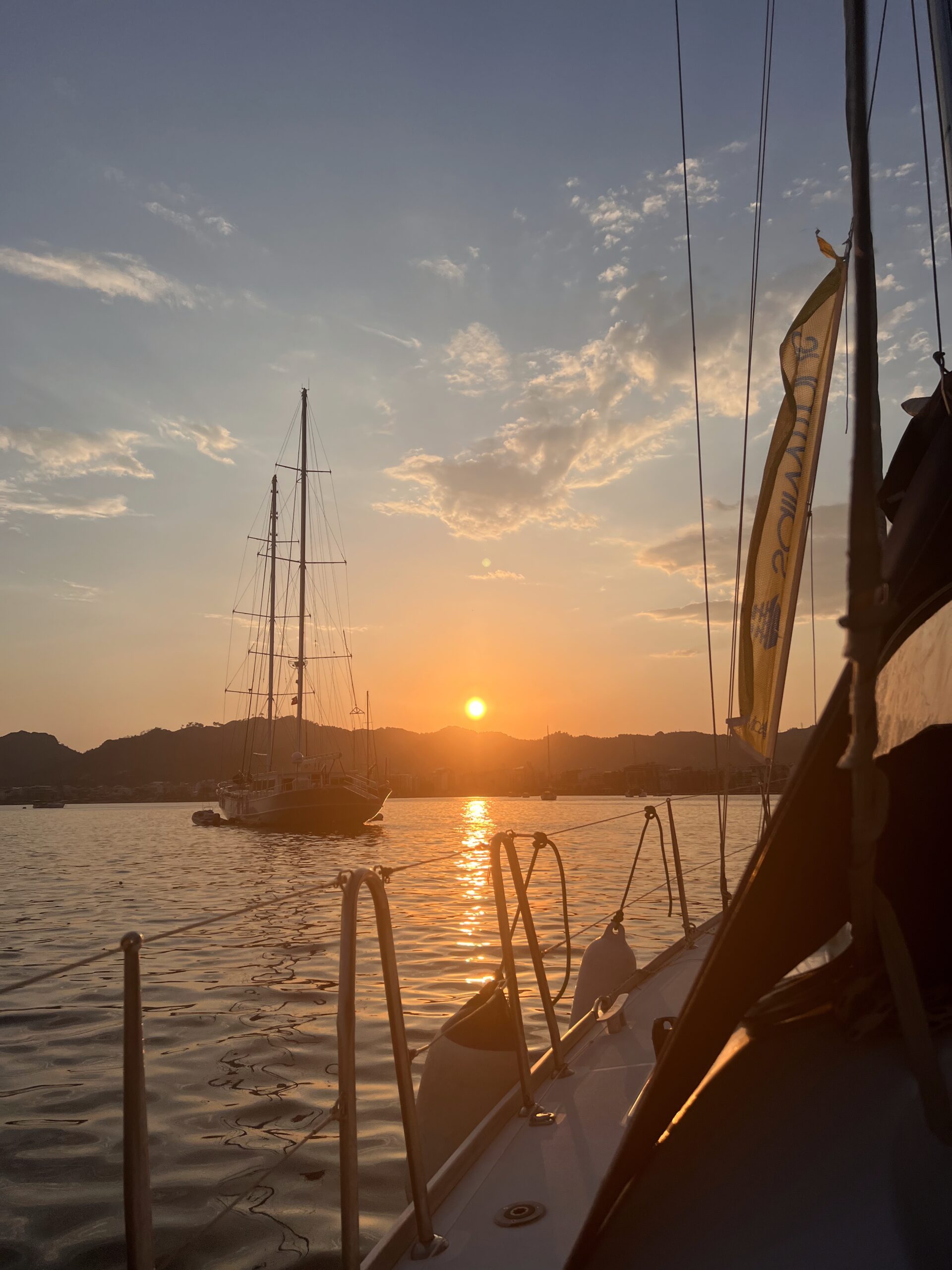 A sailing yacht along the dramatic mountainous Lycian coast of Turkey