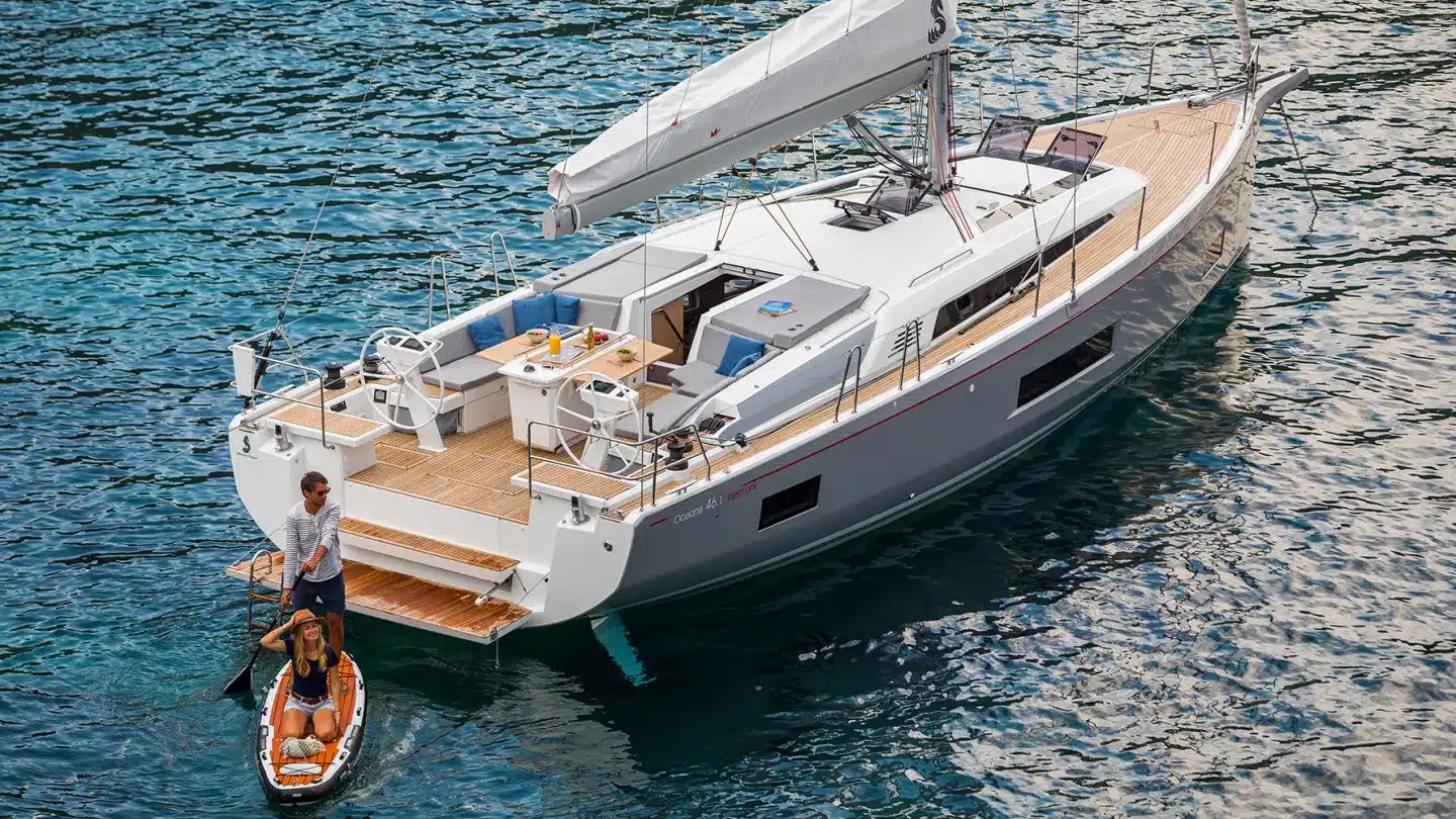 A modern sailing yacht showing the hull, mast, boom and sails